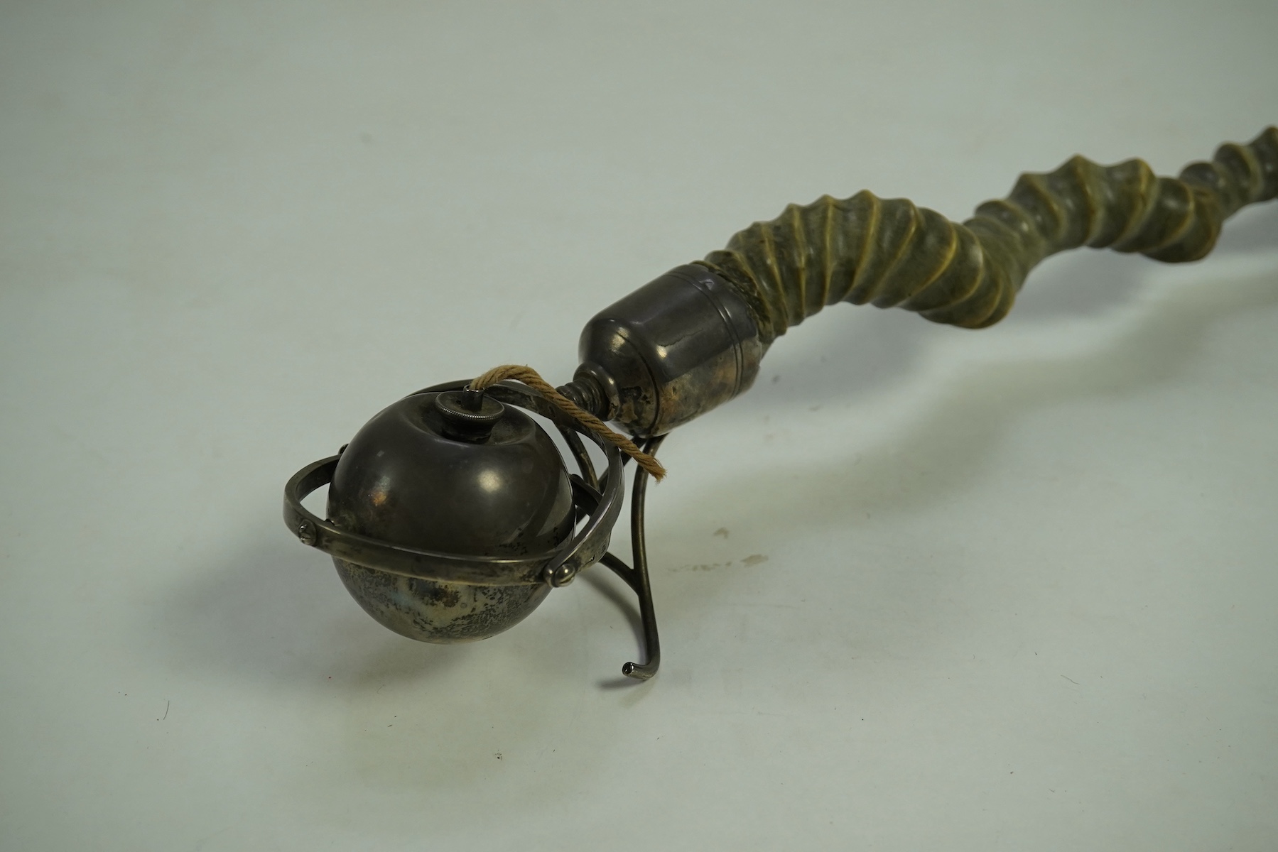 A late Victorian antelope horn handled silver orb shaped gimbal table lighter, by Joseph Braham